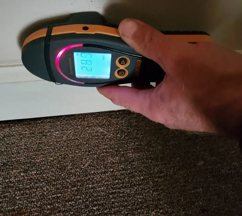 Moisture detection at baseboard during Storm Damage Restoration in Mechanicville